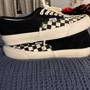 Checkered white and black Vans Woman’s size 10.5